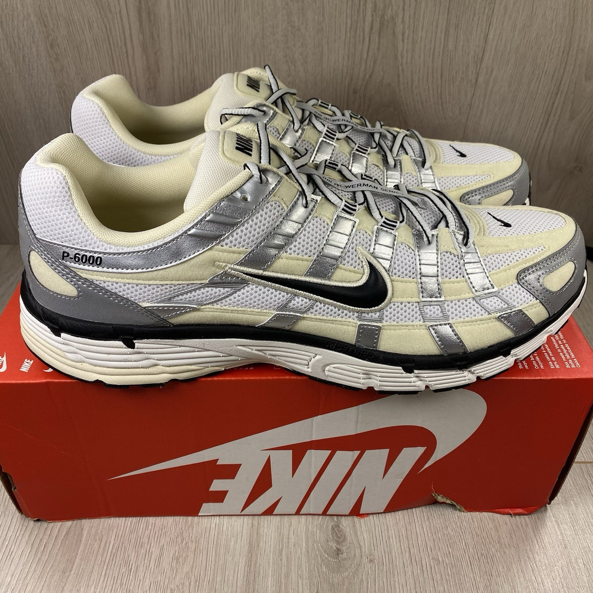 Nike P-6000 trainers white metallic silver accents with mesh and leather details