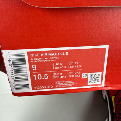 Nike Air Max Plus TN black trainers with light crimson and volt accents, logo on tongue.