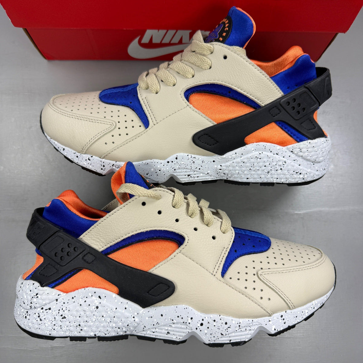 Nike athletic shoes beige with Hyper Royal accents and unique ACG Mowabb design.