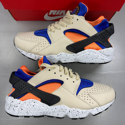 Nike athletic shoes beige with Hyper Royal accents and unique ACG Mowabb design.