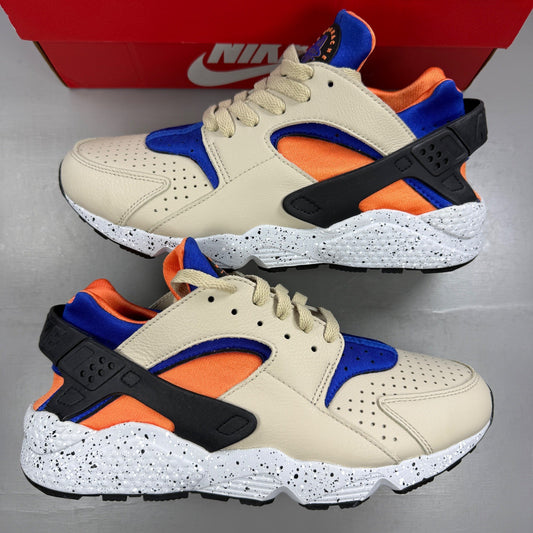 Nike athletic shoes beige with Hyper Royal accents and unique ACG Mowabb design.