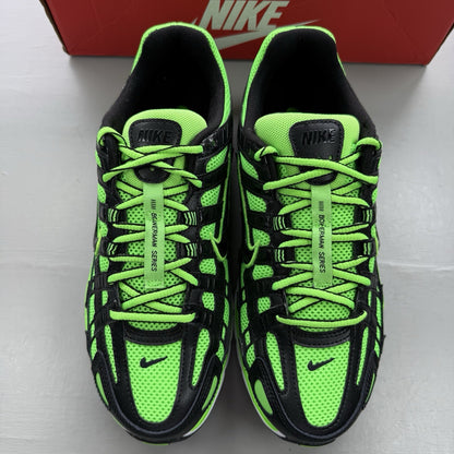 Nike P-6000 trainers black with green and white accents, mesh and synthetic material.