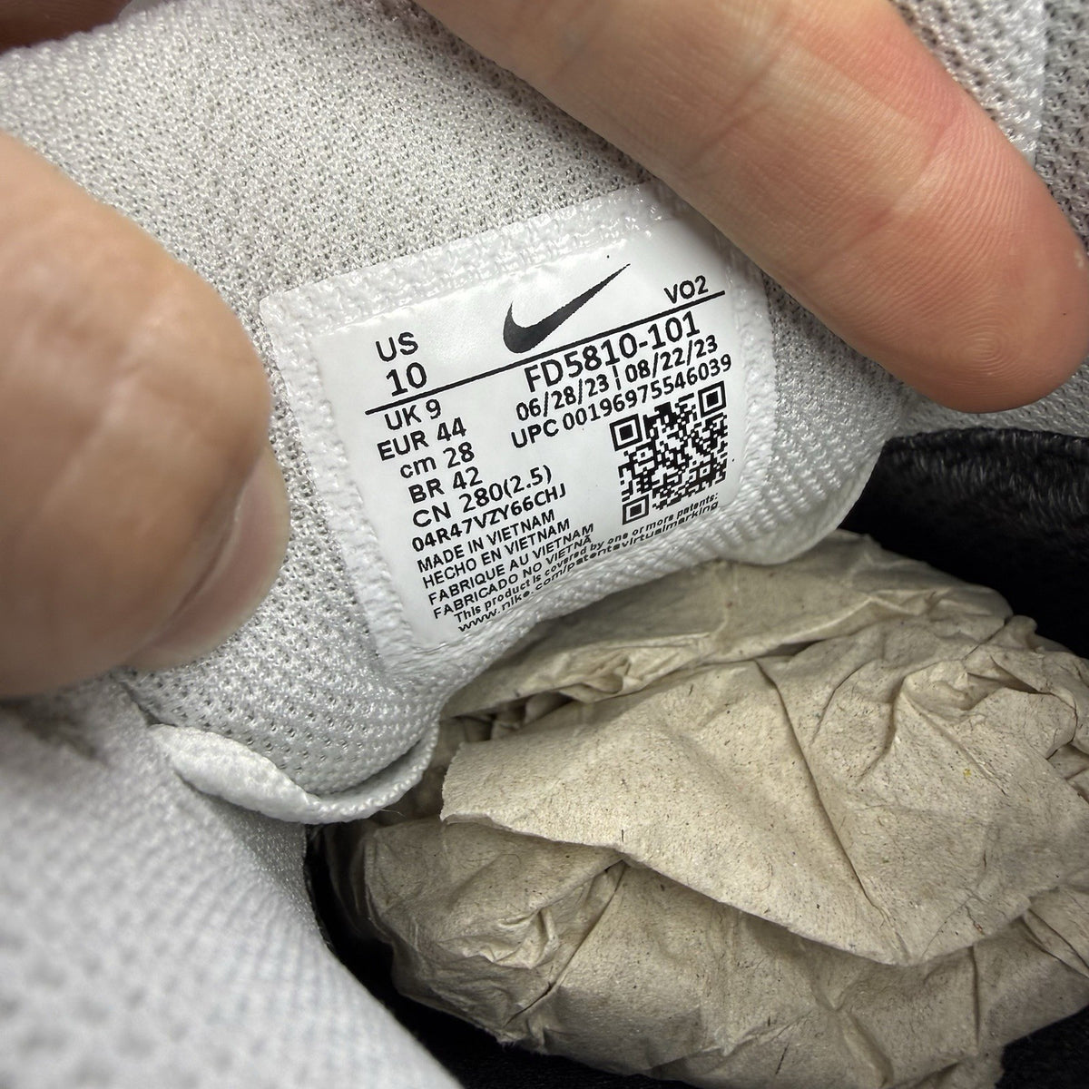 Nike Air Max 90 trainers white Gore-Tex with infrared accents and logo detail.