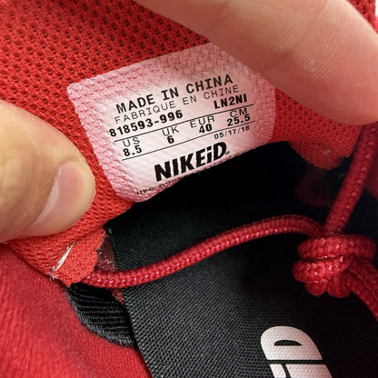 Nike Air Max 95 red maroon black white trainers with signature logo and mesh detailing.