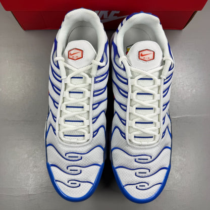 Nike running shoes white with Signal Blue accents and Air Max cushioning.
