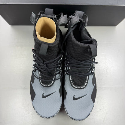 Nike black trainers with Cool Grey accents and Acronym logo details.