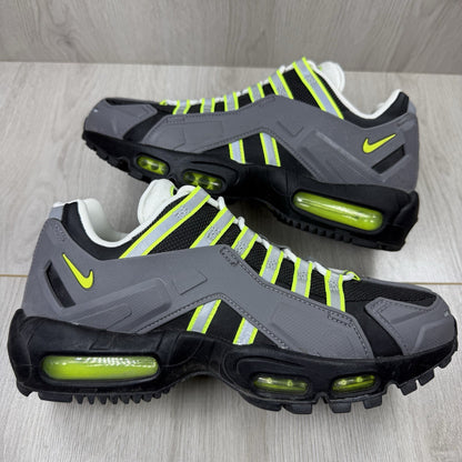 Nike Air Max 95 NDSTRKT black trainers with neon accents and textured mesh upper.