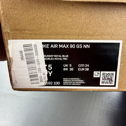 Nike Air Max 90 white athletic shoes featuring double swoosh logo and sleek design.