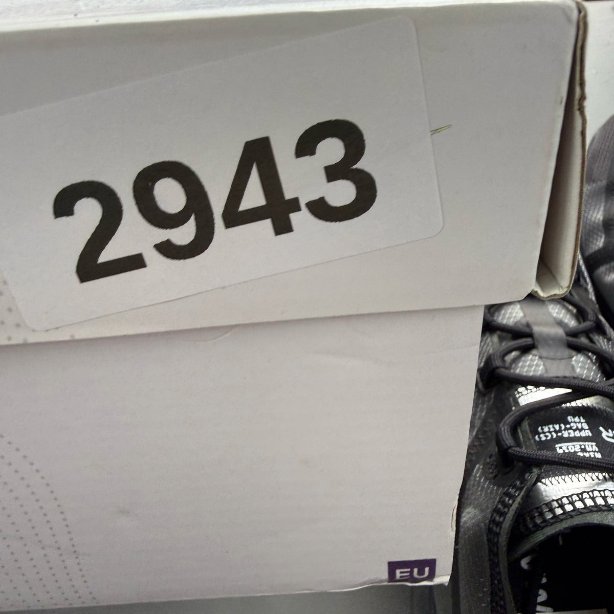 Nike Air VaporMax 2019 black trainers with distinctive air cushioning and sleek design.