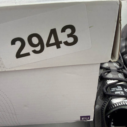 Nike Air VaporMax 2019 black trainers with distinctive air cushioning and sleek design.