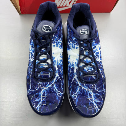 Nike Air Max Plus TN Eclair Lightning blue trainers with signature swoosh logo and mesh detailing.