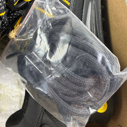 Adidas black deck shoes with gold accents and classic three-stripe logo.