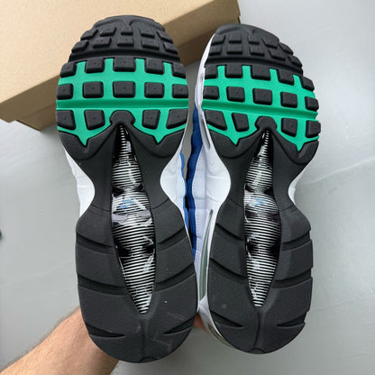 Nike Air Max 95 white trainers with big bubble design and emerald accents.