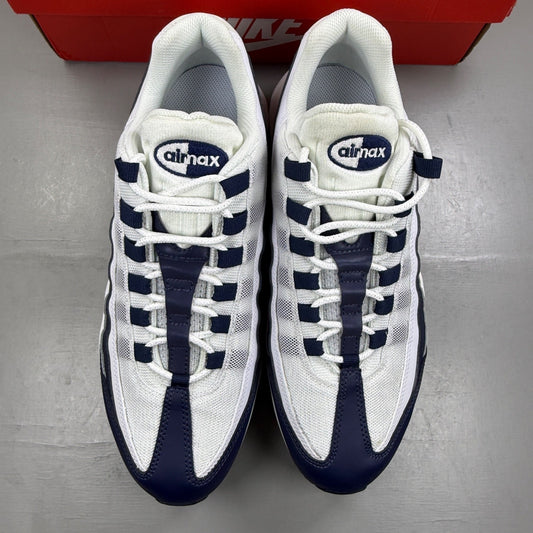 Nike Air Max 95 white trainers with navy accents and signature logo detailing.