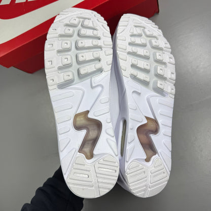 Nike trainers white mesh upper with signature swoosh logo and cushioned sole.