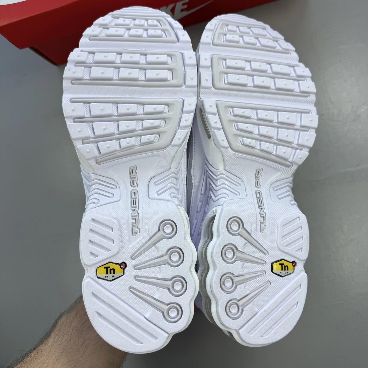 Nike Air Max Plus TN 3 white trainers with logo detailing and mesh upper.