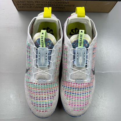 Nike multicolor Flyknit trainers in grey with distinctive air cushioning and logo detail.