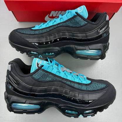 Nike Air Max 95 black sneakers with blue accents and big bubble sole design.