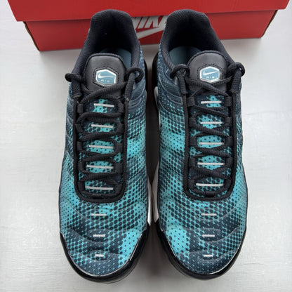 Nike Air Max Plus TN black with dusty cactus dot pattern and signature logo.
