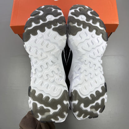 Nike React Vision black trainers with white accents and logo detailing.