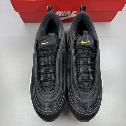 Nike Air Max 97 black trainers with opti yellow accents and white sole.
