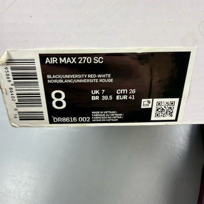 Nike Air Max 270 black trainers with university red accents and white sole.