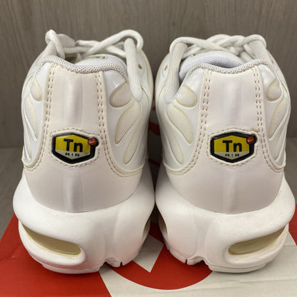 Nike Air Max Plus TN trainers white with silver accents and visible logo.