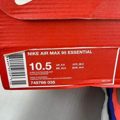 Nike Air Max 95 grey sneakers with Ultramarine and Platinum accents, featuring logo detail.