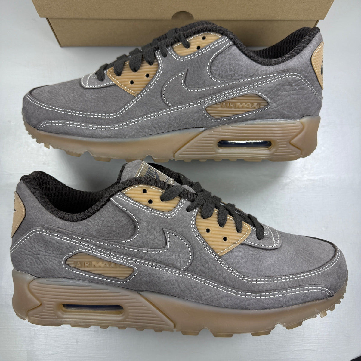 Nike deck shoes brown with gum sole and logo detailing.