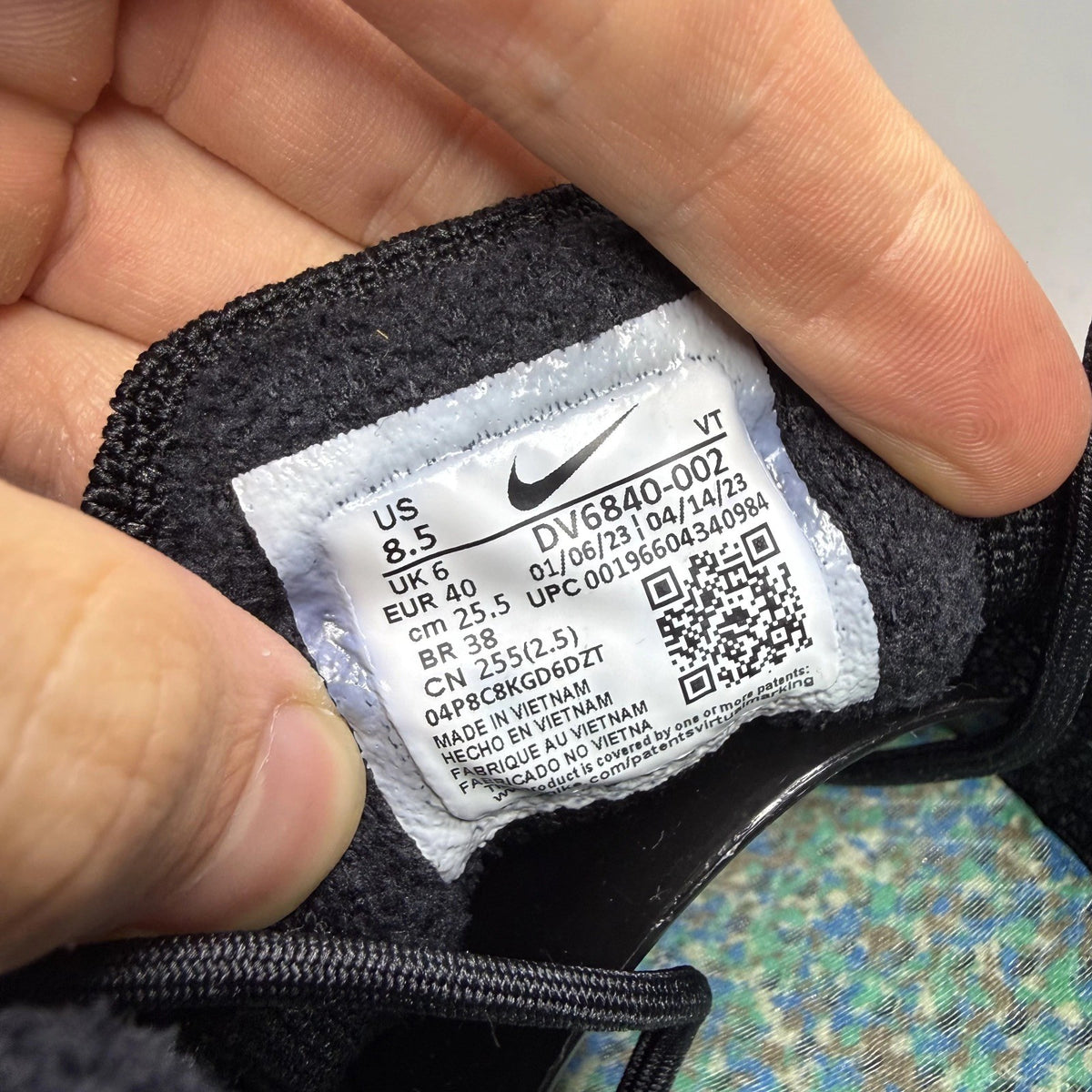 Nike black Air VaporMax trainers with Flyknit upper and signature swoosh logo.