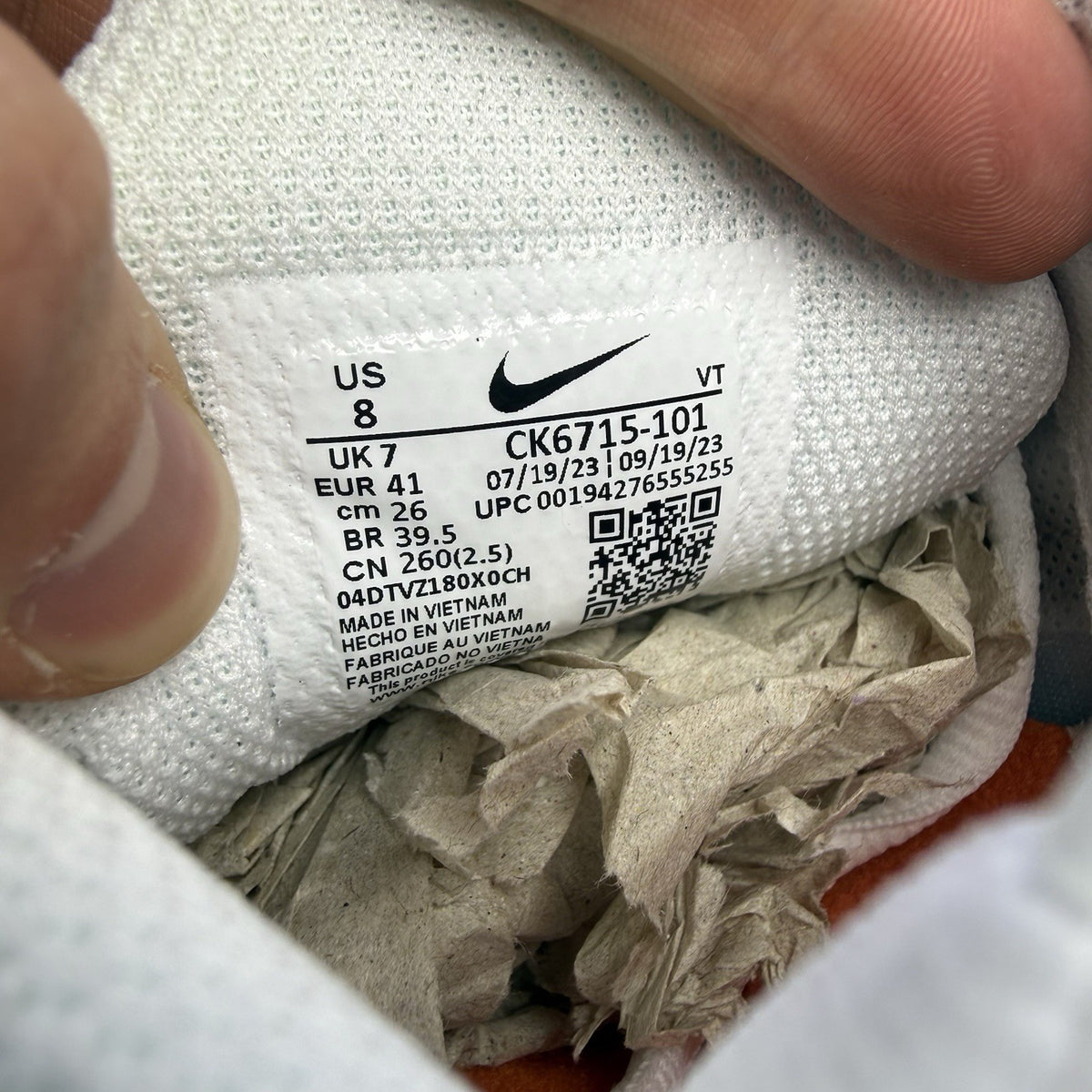 Nike Air Max Plus TN 3 white trainers with black and team orange accents, logo detail.
