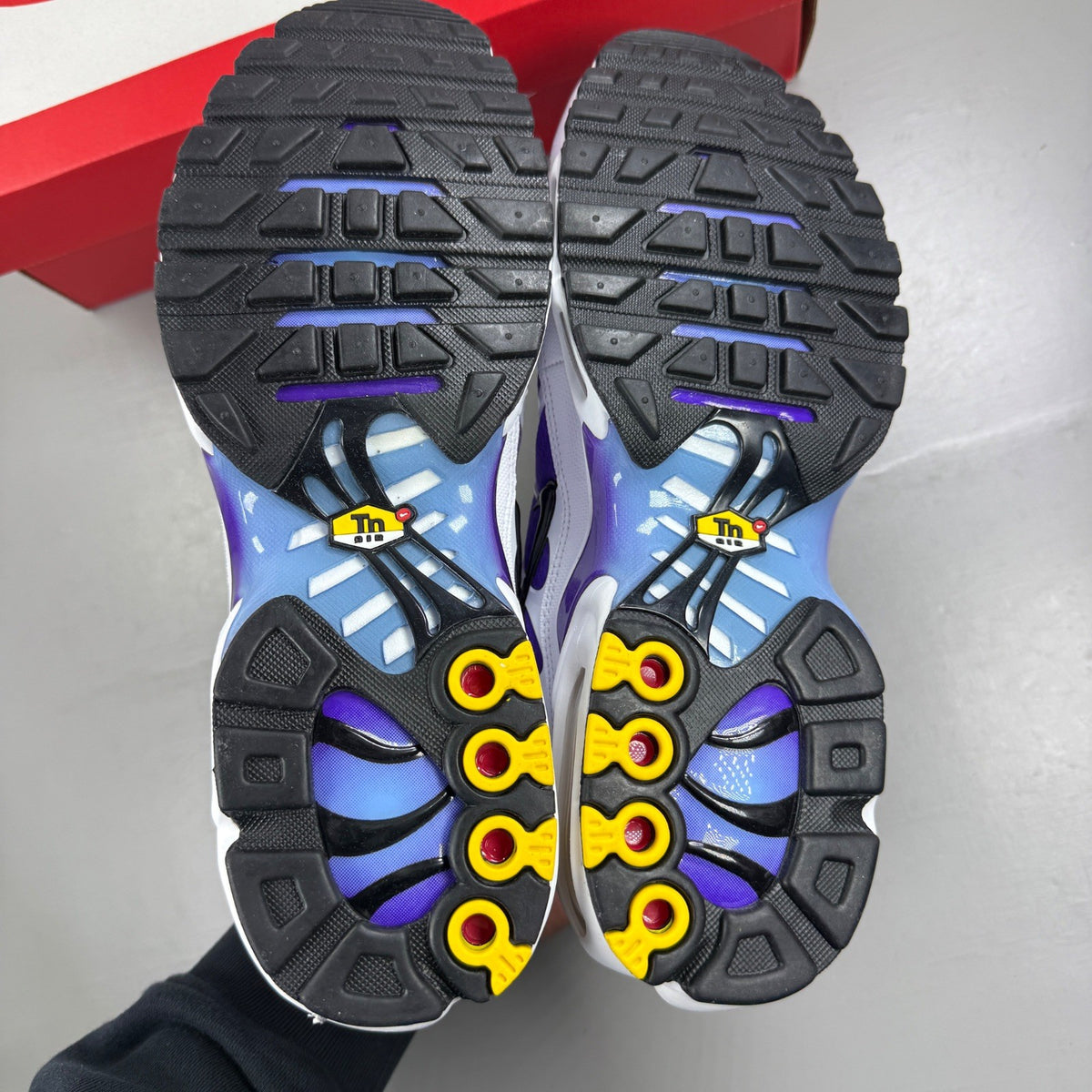 Nike deck shoes white gradient with blue and purple accents, featuring signature logo.