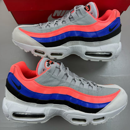 Nike Air Max 95 grey sneakers with Ultramarine and Platinum accents, featuring logo detail.