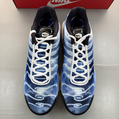Nike Air Max Plus TN blue trainers with distinctive wave pattern and logo.