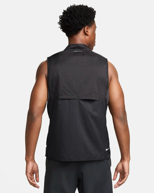 Nike black running vest with logo detail and breathable material.