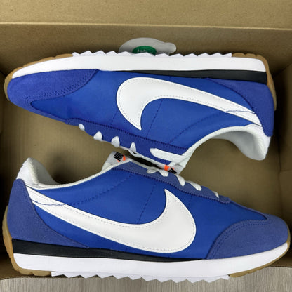 Nike trainers game royal blue with white and black accents, featuring logo detail.