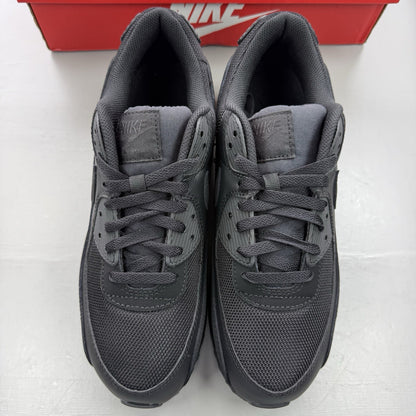 Nike Air Max 90 Recraft black trainers with textured upper and signature swoosh logo.