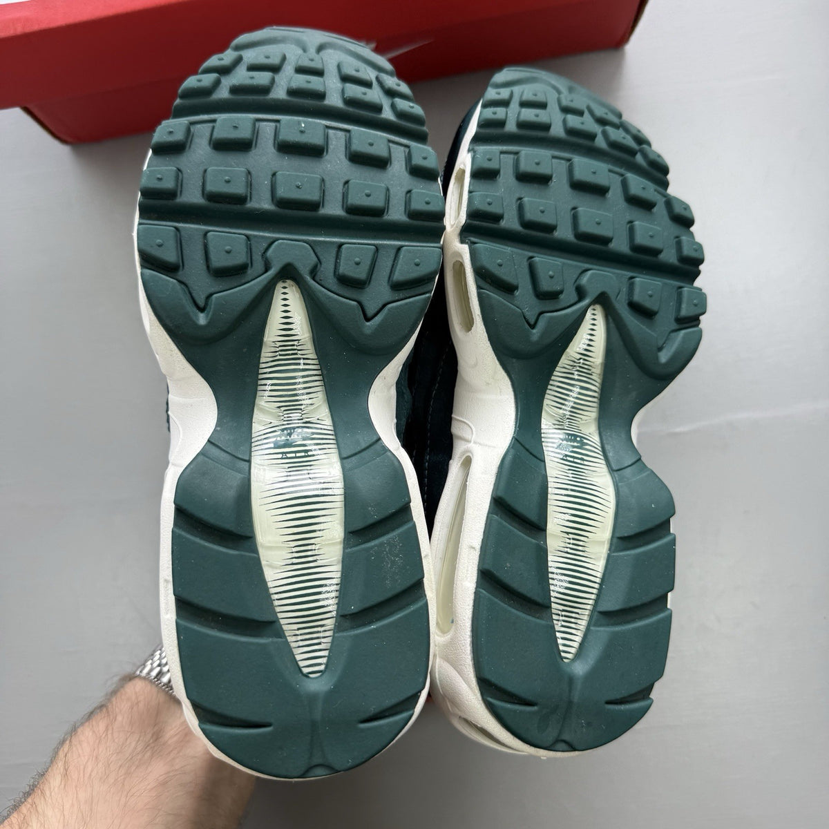Nike Air Max 95 green velvet trainers with teal accents and white sole.