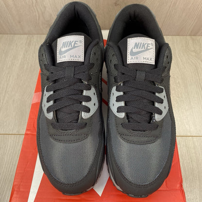 Nike Air Max 90 trainers black with anthracite and cool grey accents, featuring logo details.