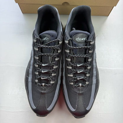 Nike black Air Max 95 trainers with reflective details and logo.