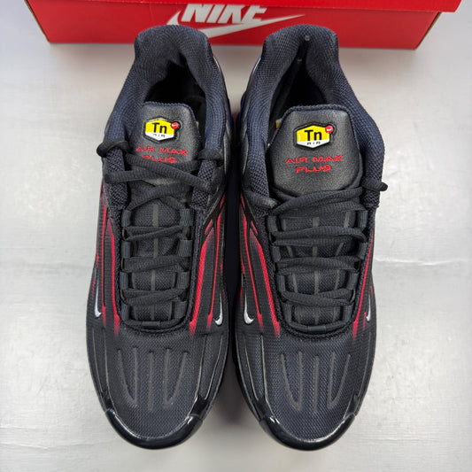 Nike trainers black with Spider-Man graphic and Air Max Plus TN design.