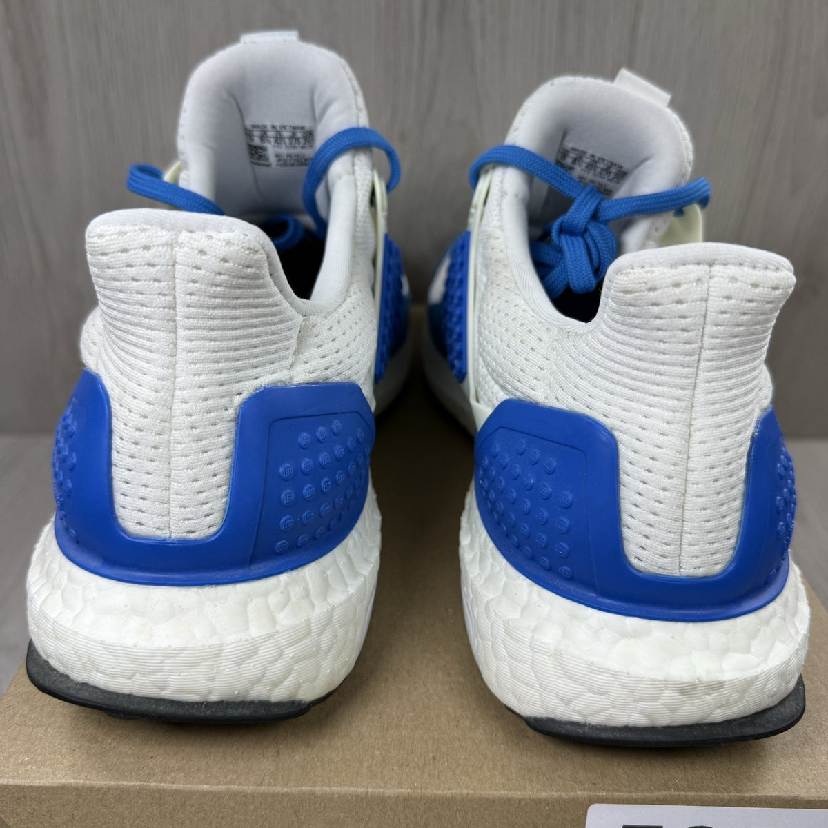 Adidas grey Ultra Boost trainers with blue accents and distinctive LEGO branding.