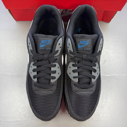 Nike running shoes black with grey accents and logo on the side.