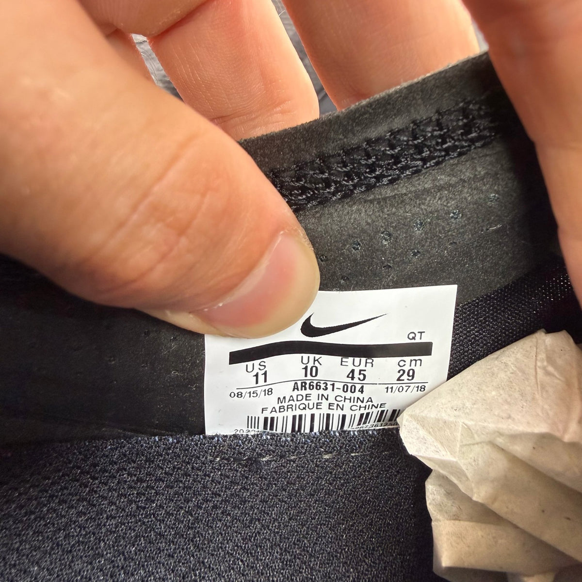 Nike Air VaporMax 2019 black trainers with distinctive air cushioning and sleek design.