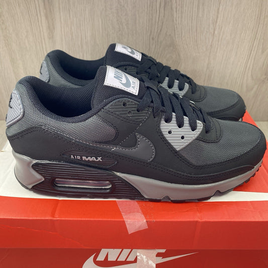 Nike Air Max 90 trainers black with anthracite and cool grey accents, featuring logo details.