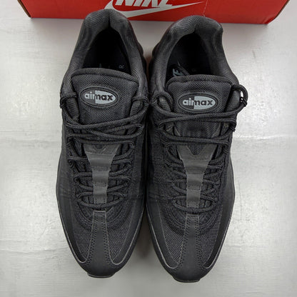 Nike Air Max 95 black trainers with grey accents and textured material.