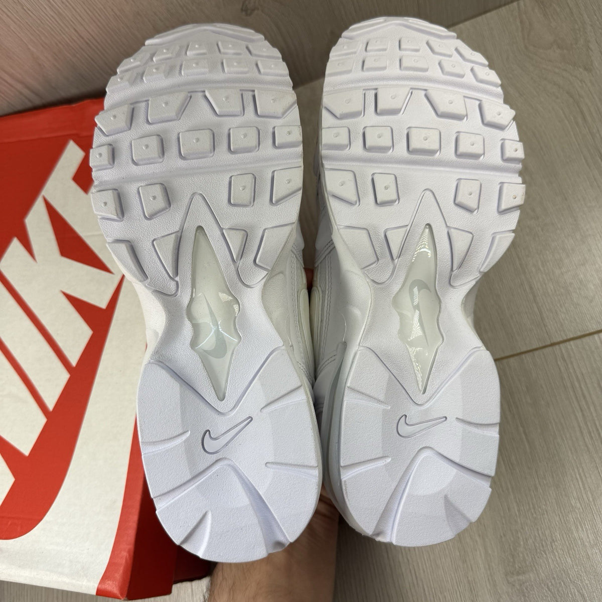 Nike Air Max 96 II trainers white with yellowing from storage and classic design.