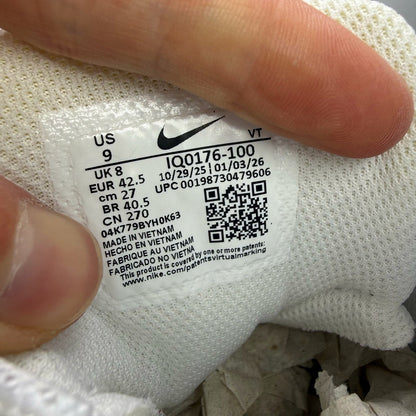 Nike Air Max 95 white sneakers with signature big bubble sole and logo detail.