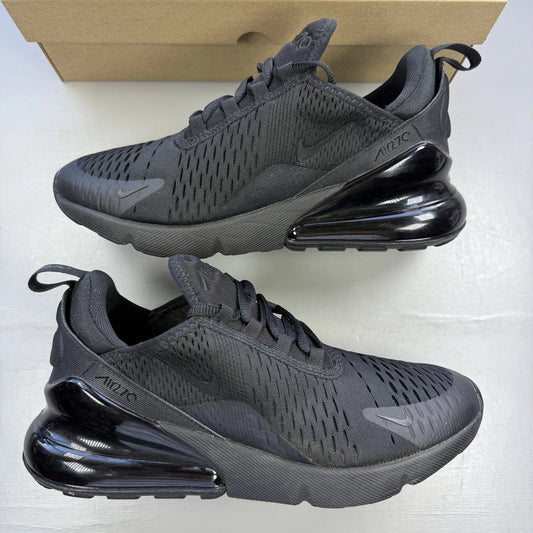 Nike Air Max 270 black trainers with logo detailing and breathable mesh upper.