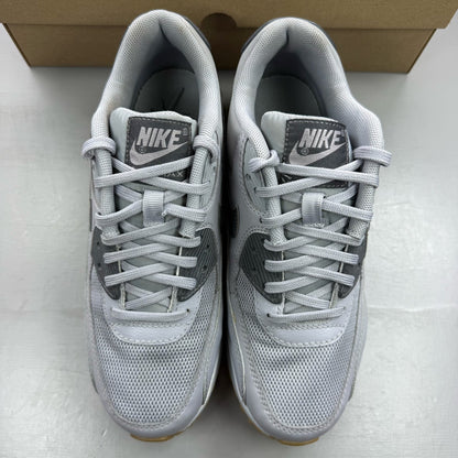 Nike Air Max 90 grey trainers with gum sole and iconic swoosh logo.